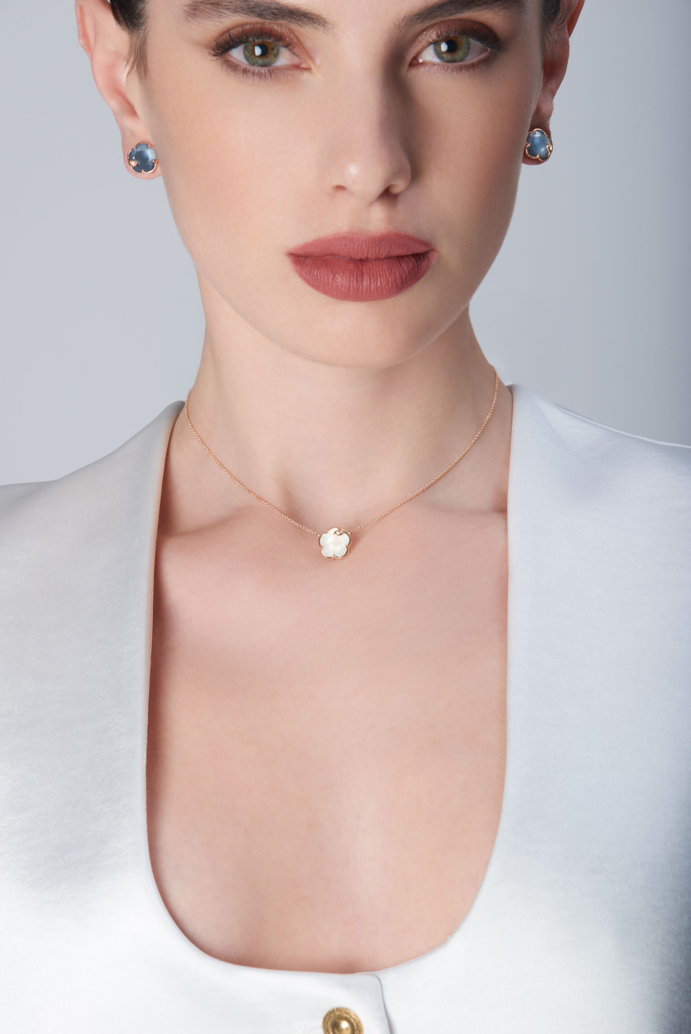 Earrings and necklace in 18k Rose Gold with coloured gems.