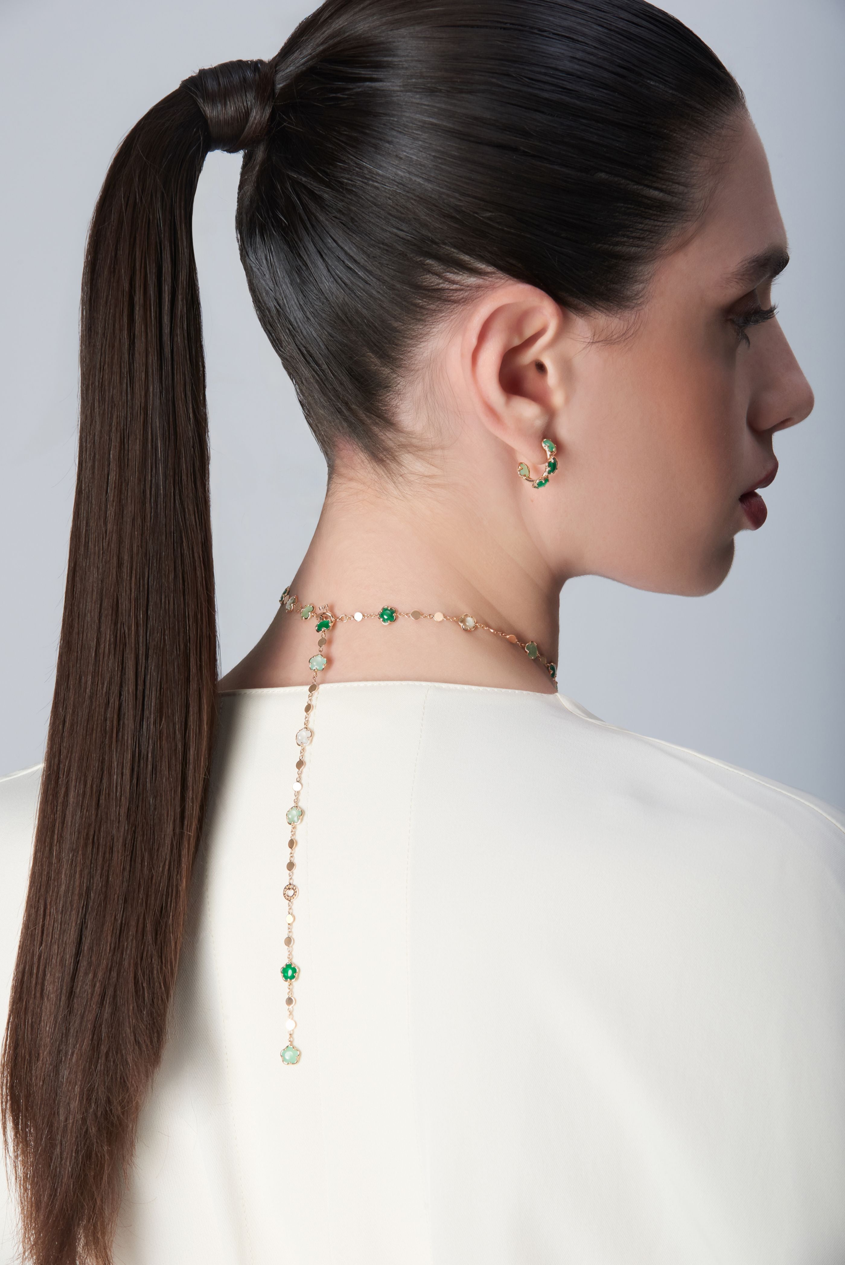 Earrings and necklace in 18k Rose Gold with green gems and Diamond.