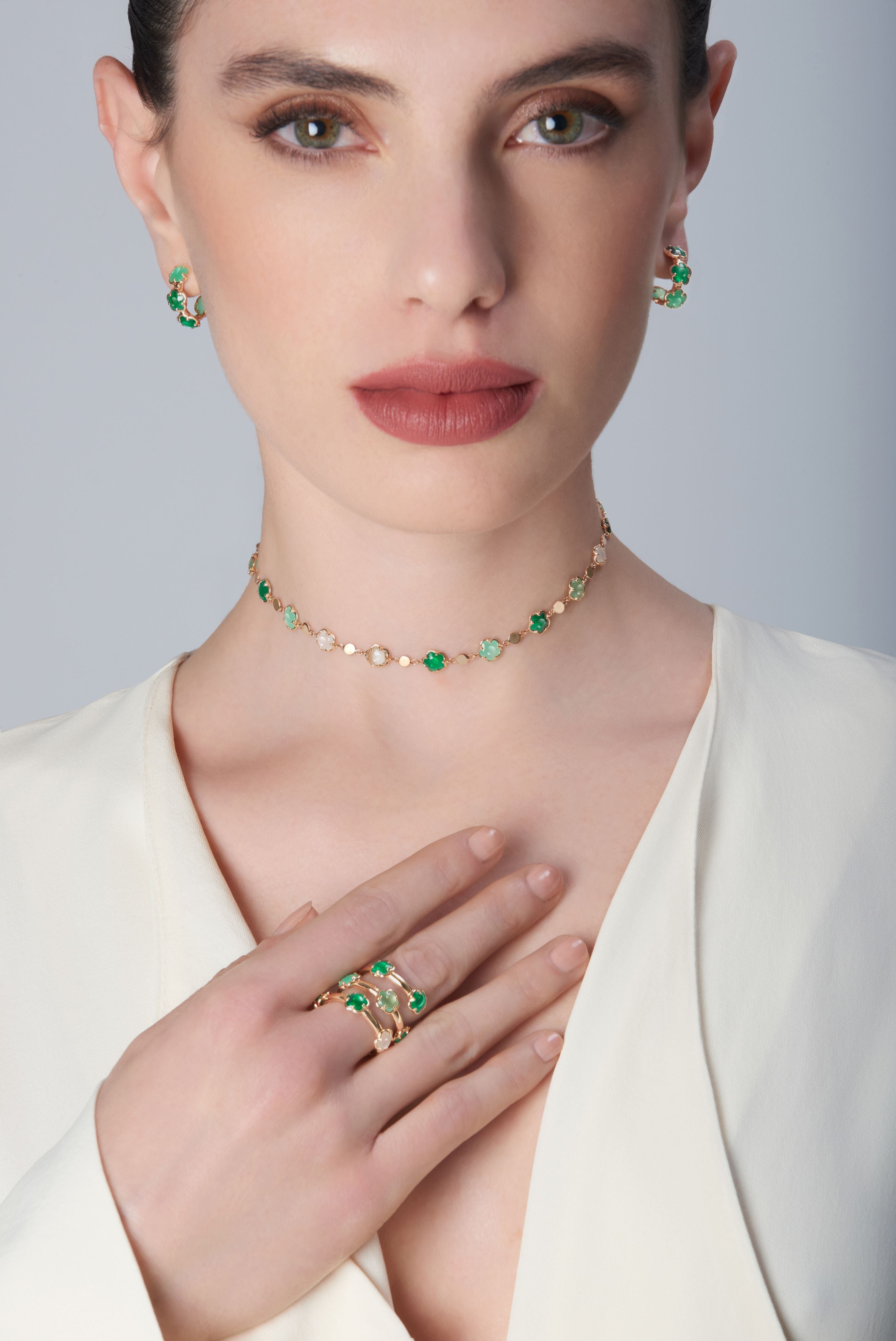 Ring, earrings and necklace in 18k Rose Gold with green gems and Diamond.