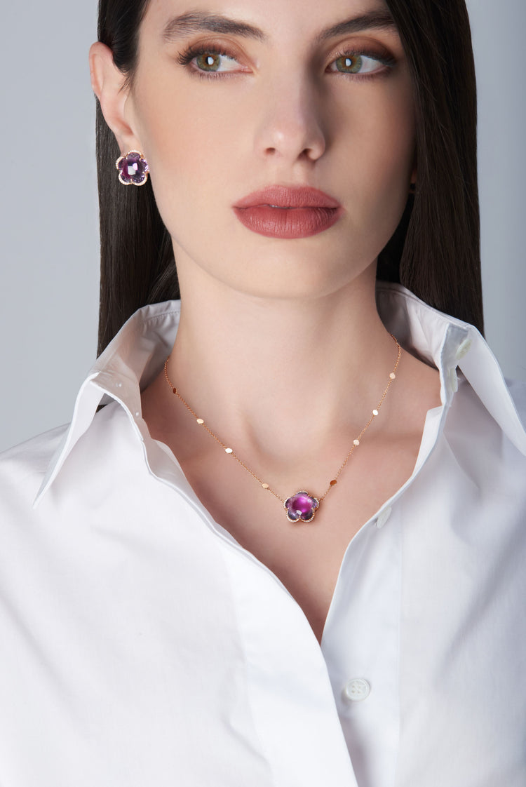 Earring and necklace in 18k Rose Gold with Amethyst and diamonds on model with white shirt