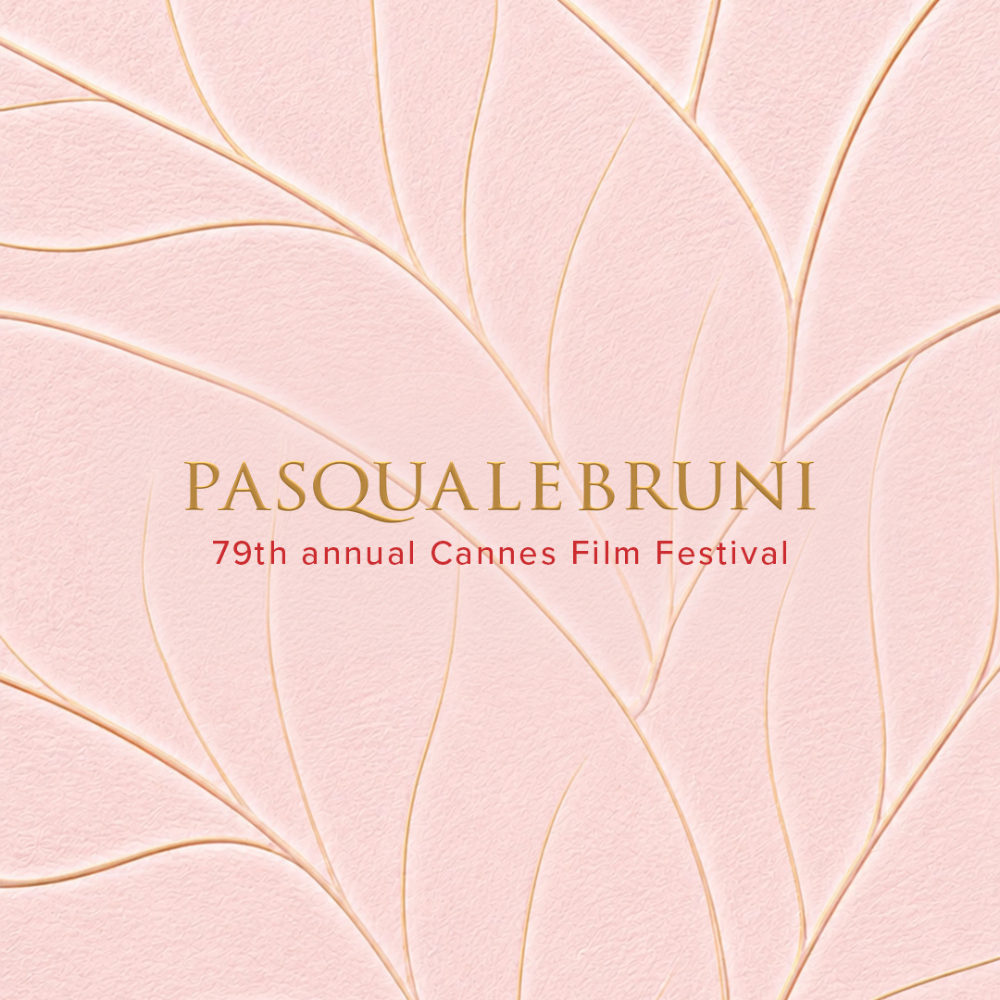 Pasquale Bruni logo on a pink background with gold leaf patterns